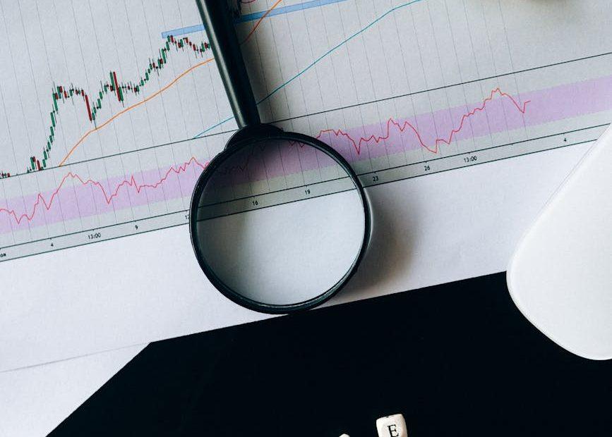 Diagram showing a magnifying glass over a graph, symbolizing market opportunity discovery.
