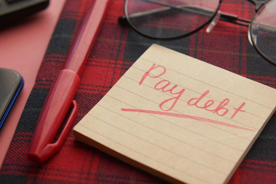 Business debt management strategies and financial health infographic.