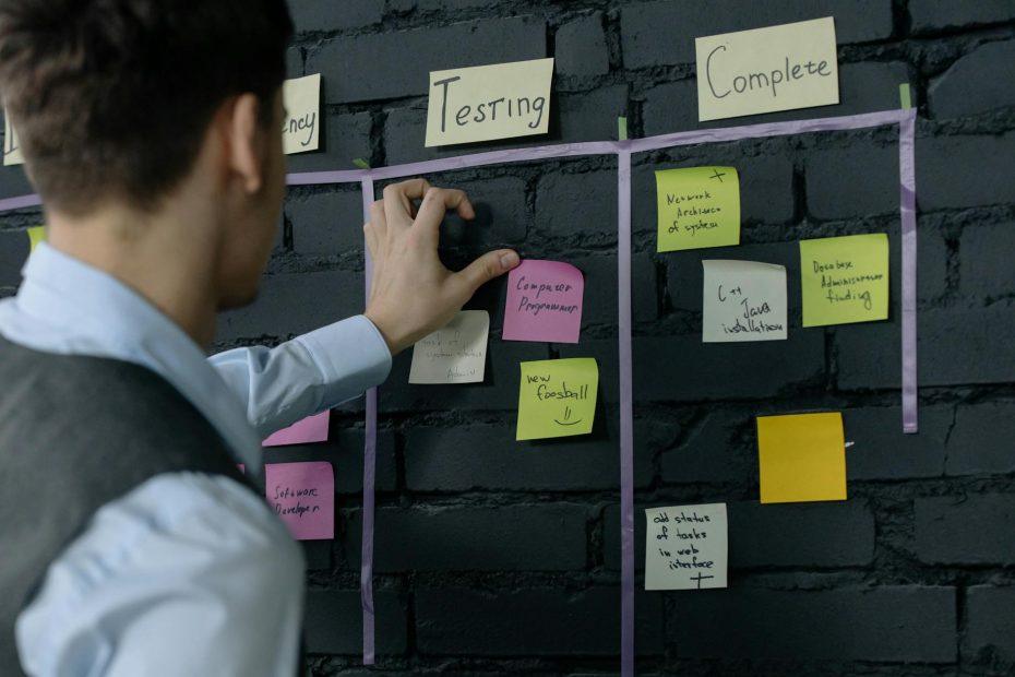 Man and woman collaborating to delegate tasks.